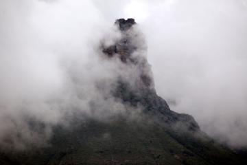 Mountain enveloped in clouds