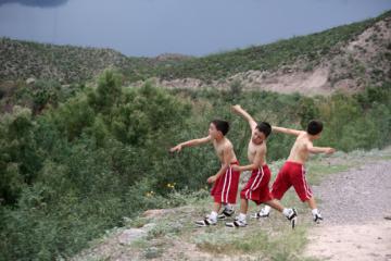 Jonathan throws a rock to Mexico