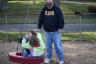 Ian pushes the kids on the tire