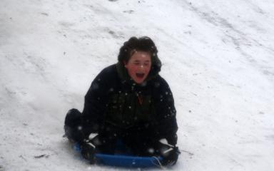 Robert sledding