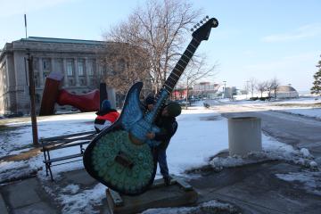 Jonathan plays big guitar