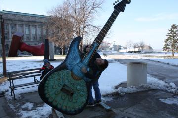 Jonathan plays big guitar